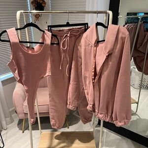 Carbon Jeans pink sweat set with high cut bodysuit